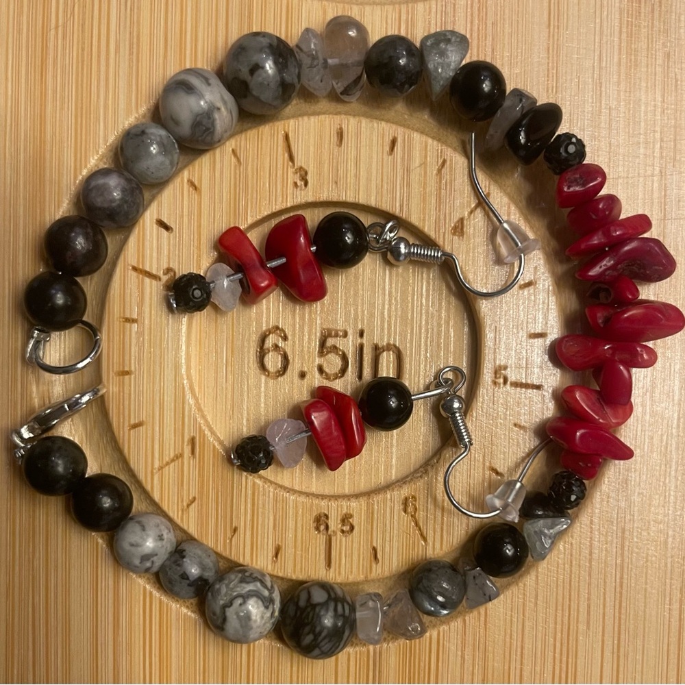 Red and black beaded bracelet and matching earrings elephant rings.